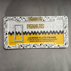 Peanuts White License Plate Frame with Yellow Accent